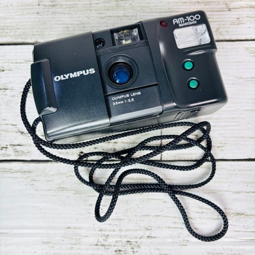 Olympus 100 quartz date - am-100,